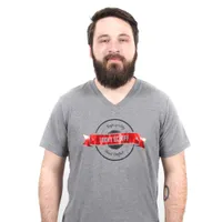 Man wearing a grey Lucky Scruff ribbon tee